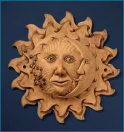 Malcolm Law Ceramics
Eclipse
Stoneware, Smooth Crank, with black iron oxide wash and gold and platinum lustres. Width 40 cms 
Malcolm Law 
